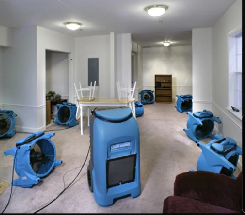 Air movers and dehumidifier setup for Water Damage Restoration in Frenchtown